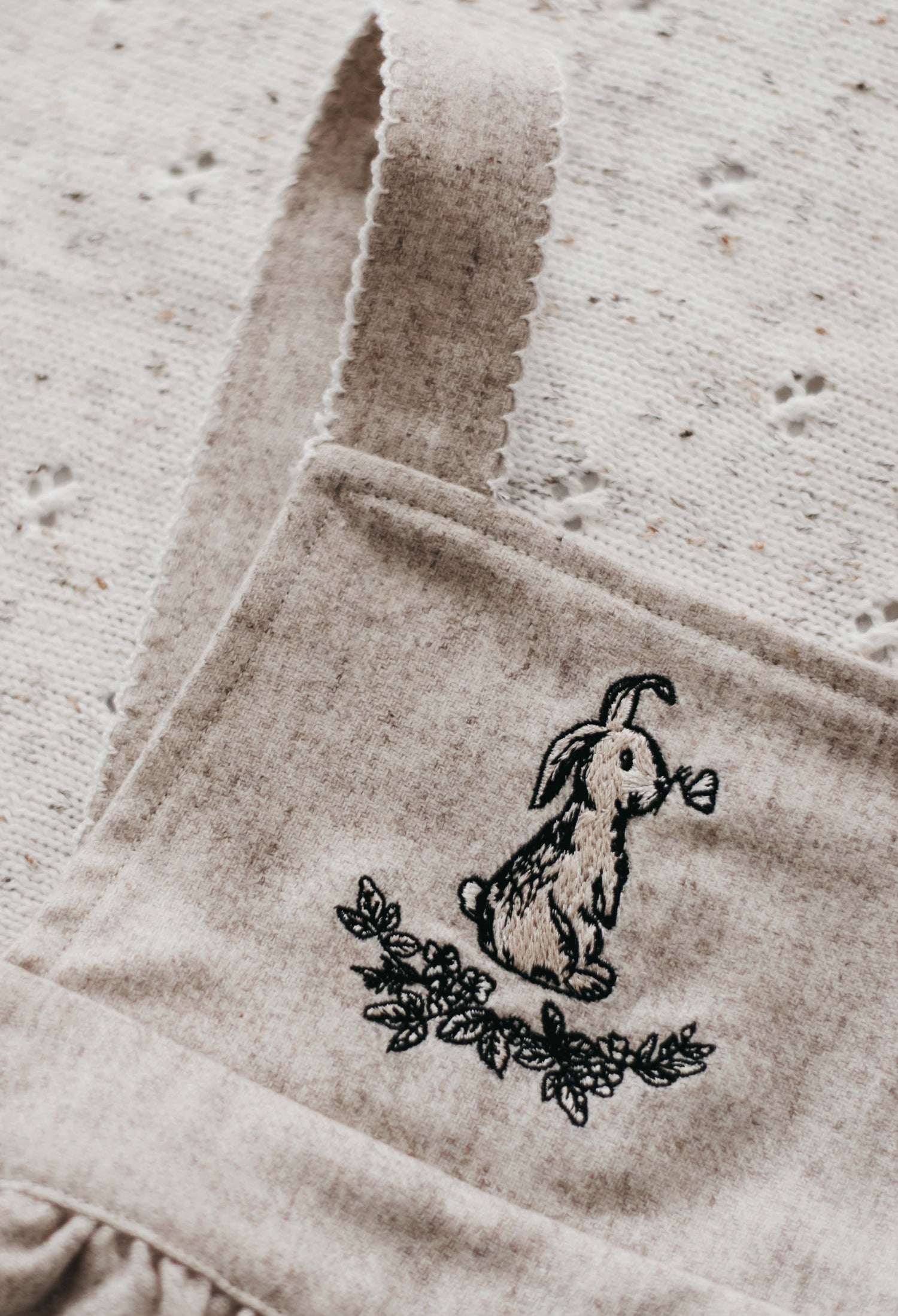 Close up view of Bunny Print on the Bencer & Hazelnut Oatmeal Linen Bunny Dress