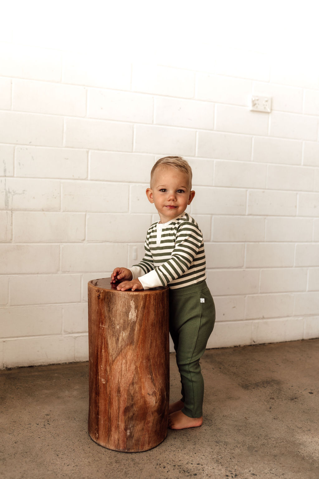 Snuggle Hunny Kids - Olive Stripe Long Sleeve Bodysuit